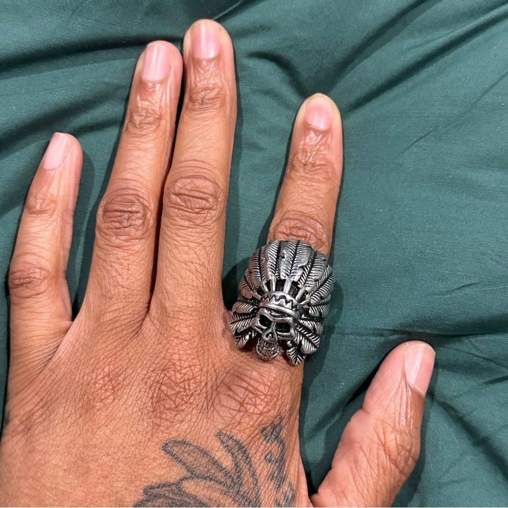 Native chief skull ring

Size 8